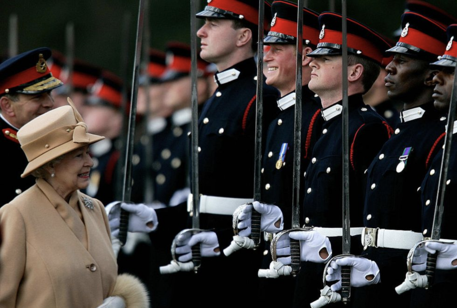 Queen+Elizabeth+II+smiling+at+Prince+Harry+Saluting+her+In+Uniform